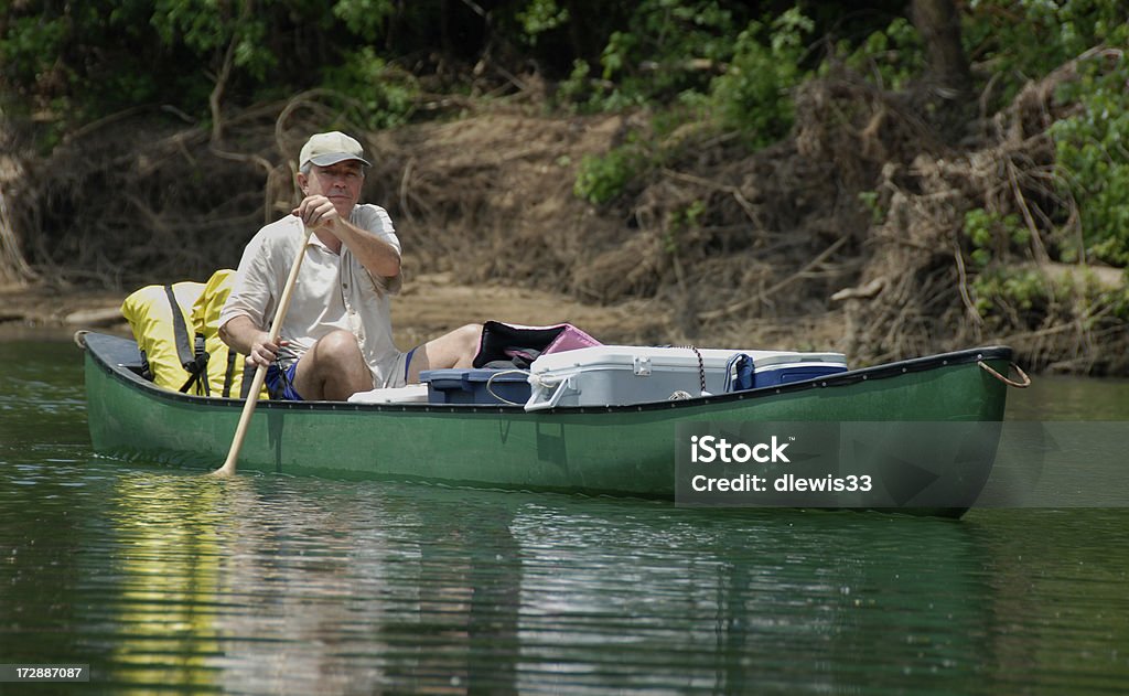 Hombre de flotación - Foto de stock de Camping libre de derechos
