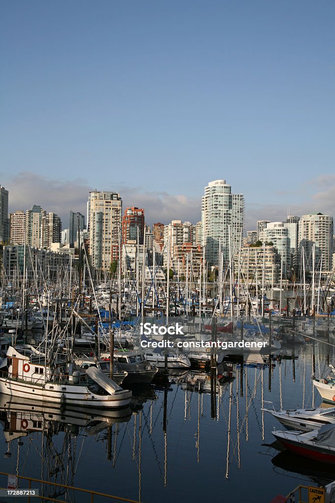 Vancouver Marina At False Creek False Creek between Burrard St Bridge and Granville Street Bridge looking toward Vancouver Skyline. Apartment Stock Photo