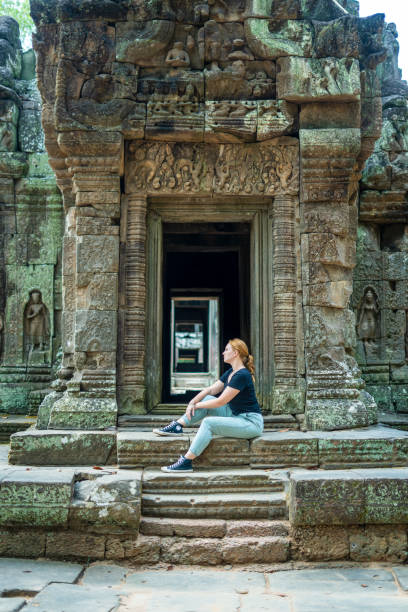istock Young Redhead Girl Exploring Angkor Wat, Cambodia 1728876399