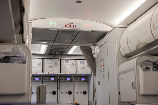 Rear end Inside a commercial airplane in the economy class