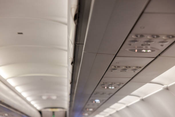 Fasten seat belt sign and prohibit the use of any electronic devices While the plane is taking off or landing