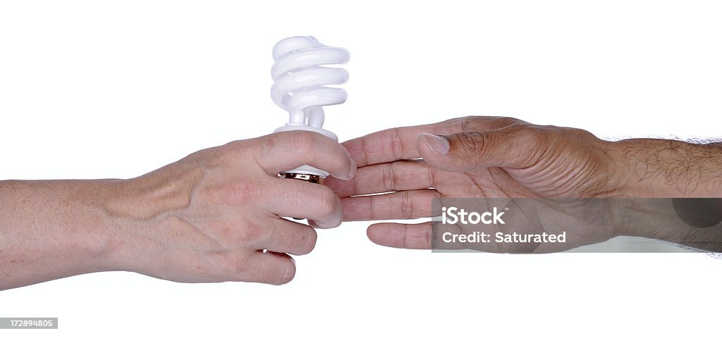 Eficiência de energia: Dar uma mão lâmpada fluorescente para outro - Foto de stock de Figura para recortar royalty-free