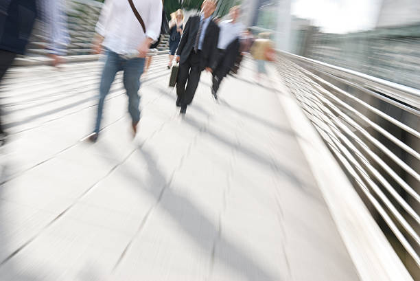 istock Commuter Zoom on Pedestrian Bridge London 172894864