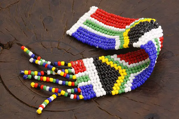 A hand made beaded South African flag bookmark.