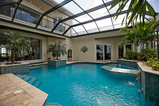 istock Luxury swimming pool with screen covered cage 172895616
