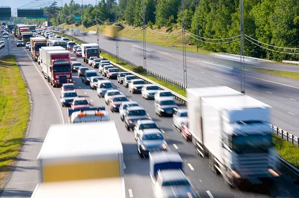 istock Traffic congestion, three motion blurred lanes 172895875