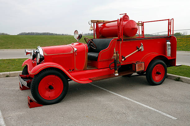 Warsaw, Poland - June 4th, 2016: Classic Chevrolet firetruck stopped on the street before the parade during the Fire Brigade Day. This truck was built in 1922, and now is one of the oldest fire trucks in Poland.