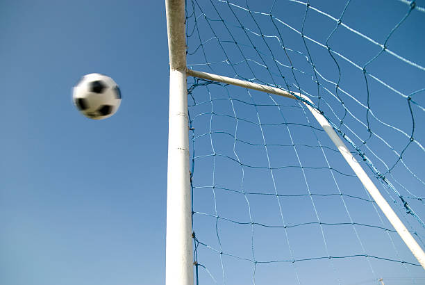 istock soccer ball going to goal 172898091