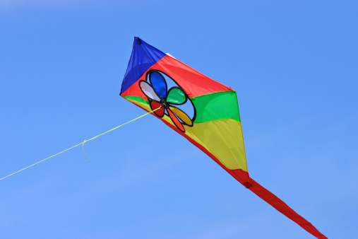A colorful kite flying in the sky