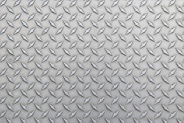 sfondo di acciaio diamante battistrada leggermente consumato orizzontale - metal plate alloy steel foto e immagini stock