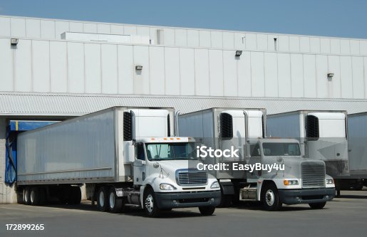 istock Trucks at loading dock 172899265