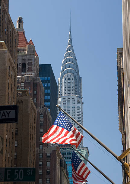 The Chrysler Building in Manhattan with US flag