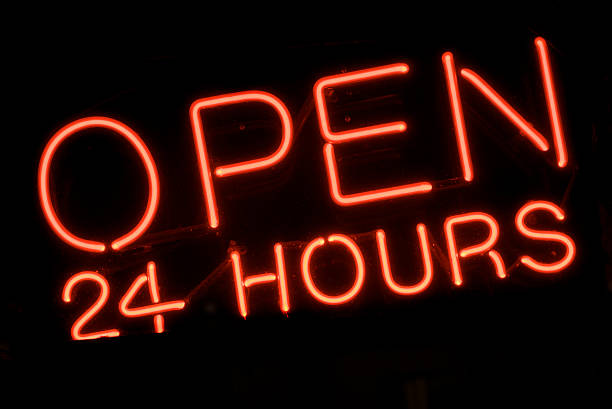 Open 24 Hours Red Neon Sign stock photo