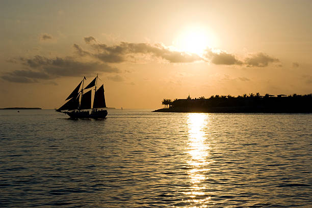 Golden Sunset sail stock photo