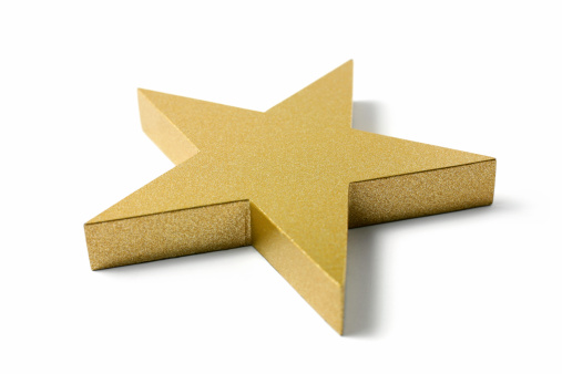 Block shape of a golden star, isolated on white background.