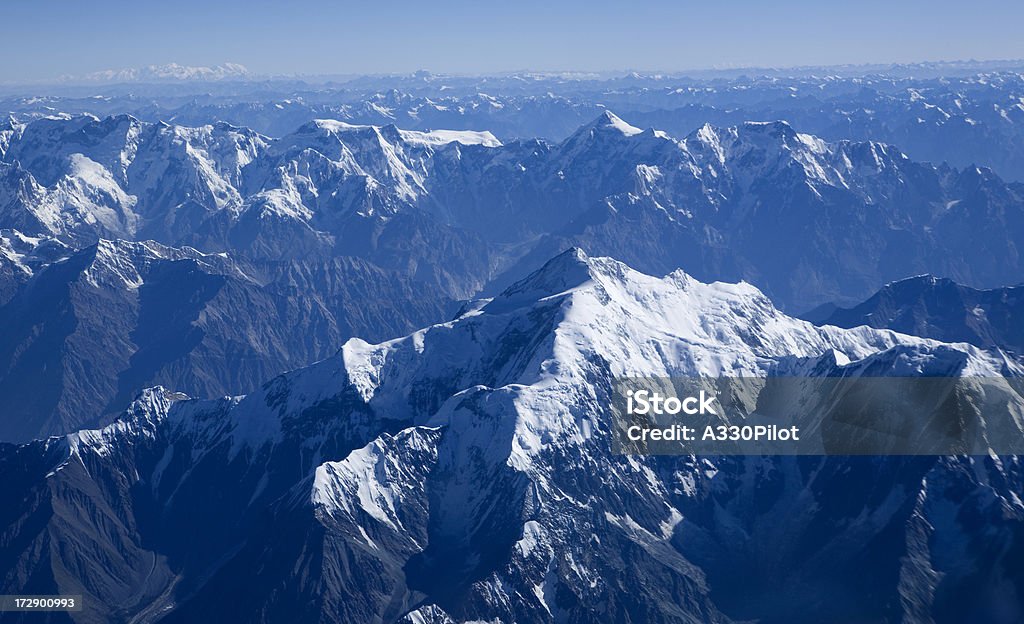 Himalaya's Himalayian Mountain range from the air. Above Stock Photo