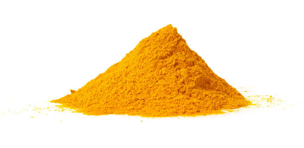 istock Heap of turmeric powder isolated on white background 1729012294