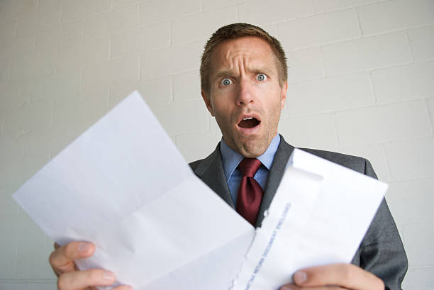 istock Young Man Businessman Opening Letter with Shocked Expression 172901562