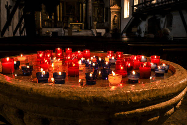 istock Colorful offering candles in a church 1729016903