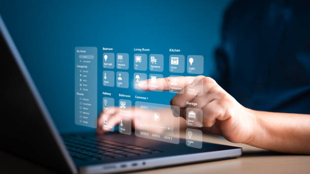 istock People use computer laptop to manage virtual screen application for control home appliances. Smart intelligence dashboard to connect IoT devices for automation. Assistant house technology management. 1729017742