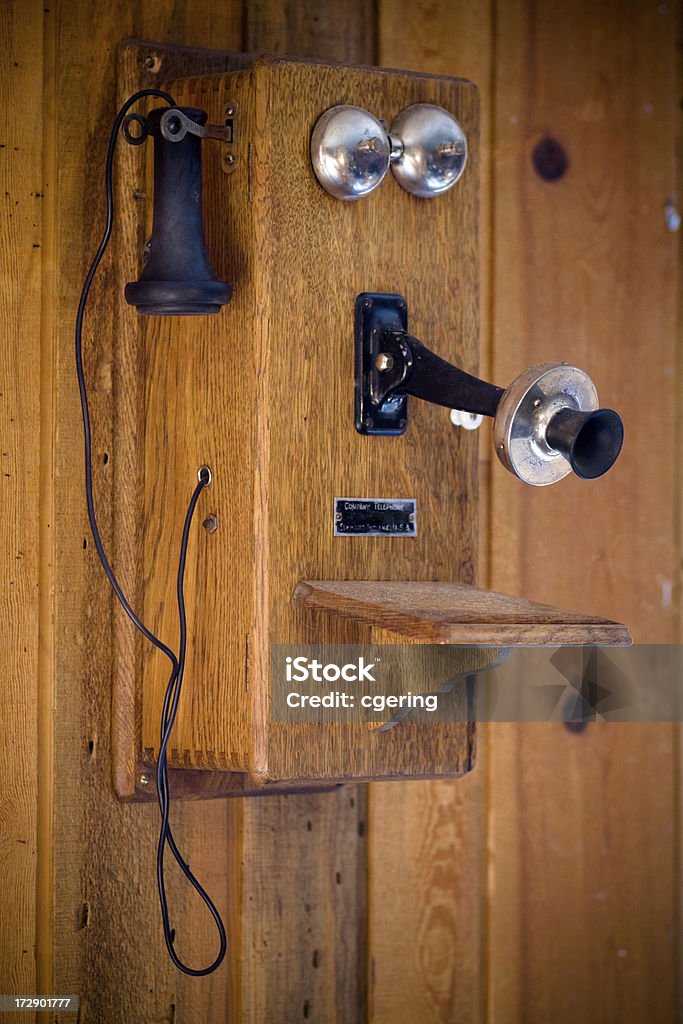 antique phone wall mounted telephone circa 1900. Candlestick Phone Stock Photo