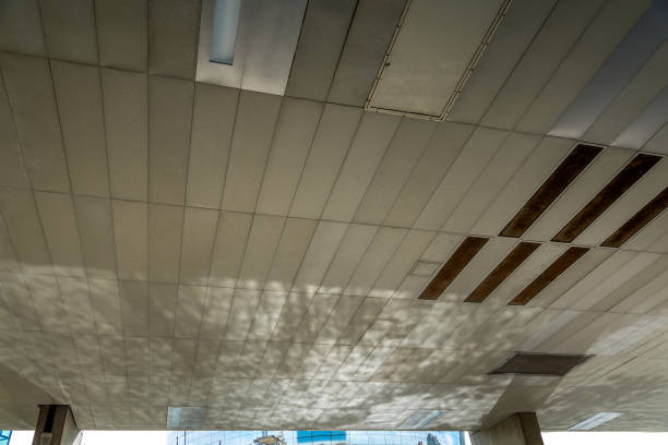 istock Open space on the base of the skyscraper building with a maintenance holes. 1729018006