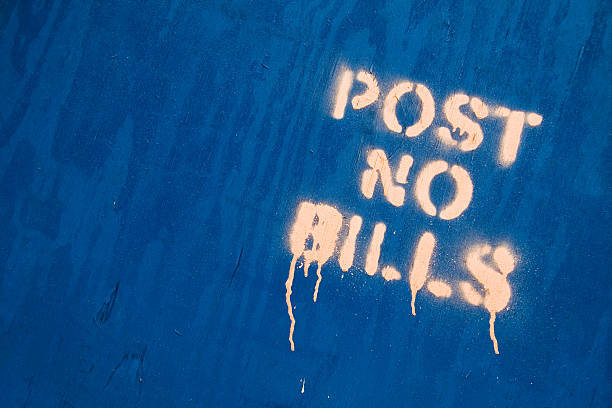 istock Spray paint on blue plywood states: 'Post No Bills'. 172902114