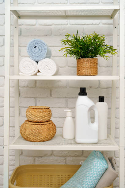 istock Rolled fluffy towels on shelf in bathroom 1729024147