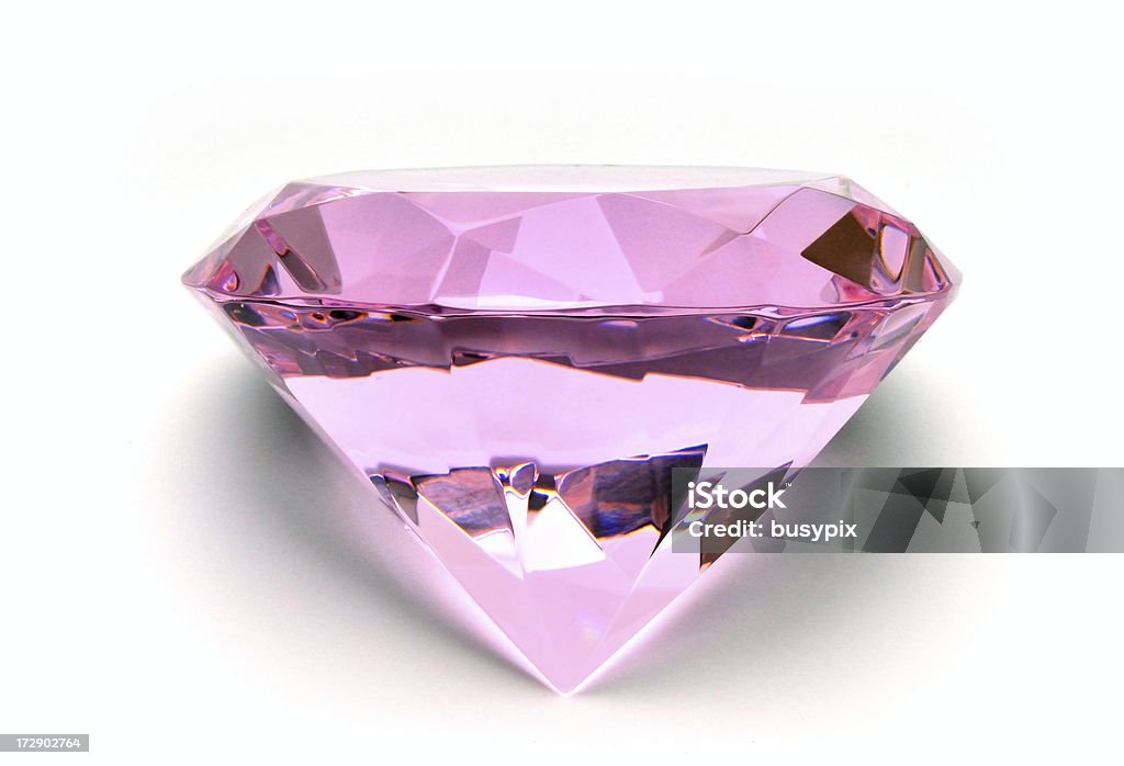 Pink Diamond Series Close-up of a large pink gem on a white background. Diamond - Gemstone Stock Photo