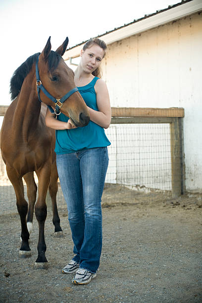 istock Young Woman with Horse 172903520
