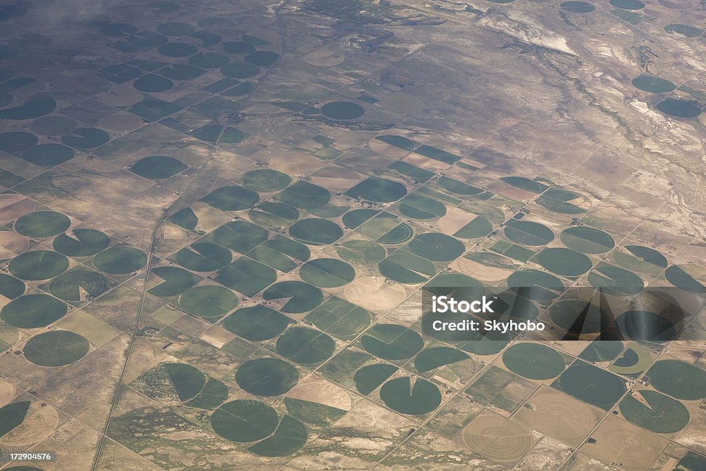 Desert Irrigation Aerial view of circular irrigation in Northern New Mexico Farm Stock Photo