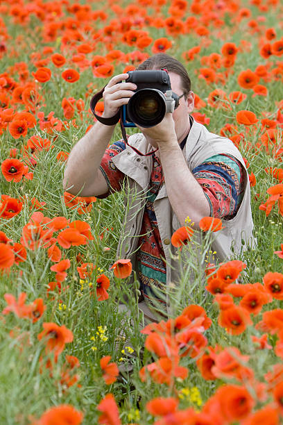 istock Photographer And Poppies 172905048
