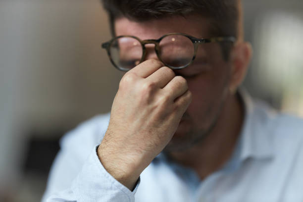 istock Overworked businessman having a headache. 1729064108