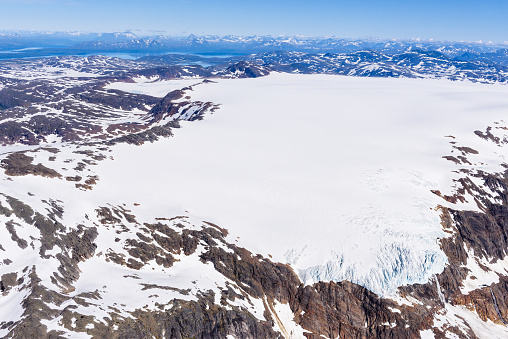Aerial view of glacier in mountain scenery