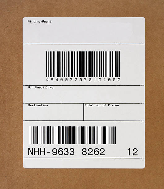 Blank Shipping Label "A generic shipping label. All of the bar codes, and numbers have been altered and scrambled. Even if scanned do not provide any information." bar code photos stock pictures, royalty-free photos & images