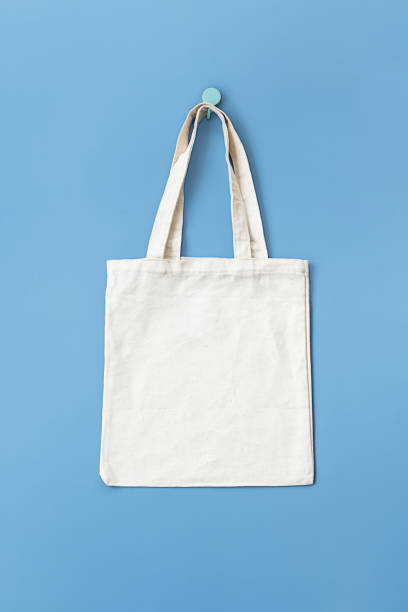 istock Tote bag hanging on hook. Mock up reusable bag. 1729076061