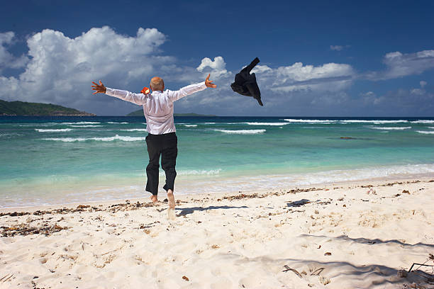 istock senior running into the water 172908223