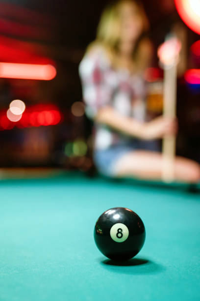 istock 8 Ball from pool or billiards on a billiard table. People entertainment game concept 1729097910