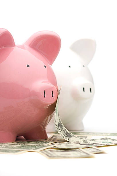 istock Piggy bank couple 172910106