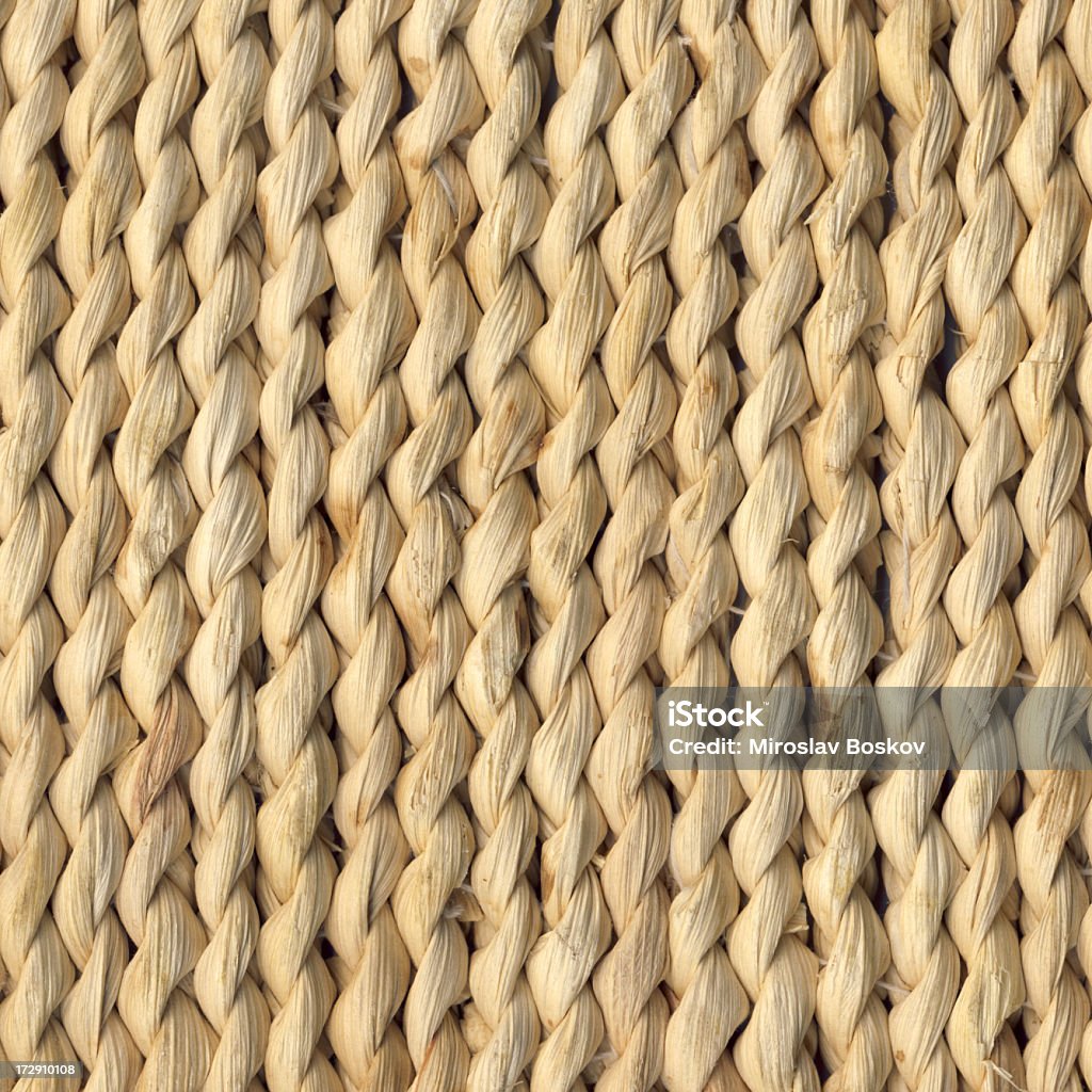 Raffia Mat High Resolution Grunge Texture High resolution old raffia table mat grunge texture, the excellent choice for implementation in various CG design projects.  Woven Fabric Stock Photo