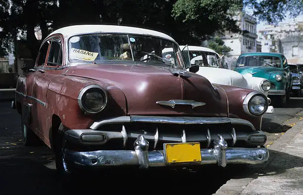 brown American oldsmobile on Havana street