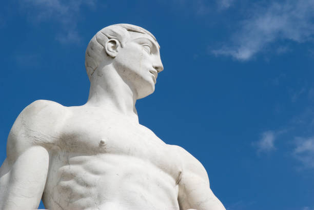 istock Statue of an Athlete in White Marble Bright Blue Sky 172910571