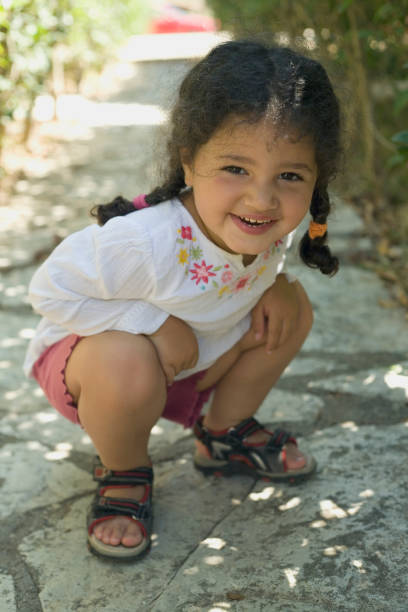 istock Little girl in a garden 172911080
