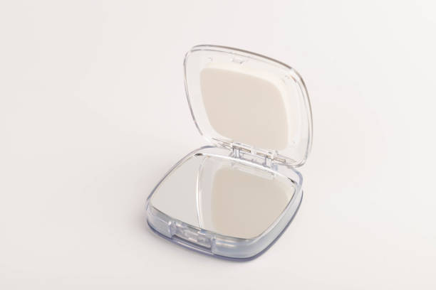 Cosmetic mirror on a white background. Space for text.