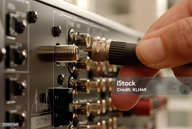 Video Cable Being Inserted Into Electronic Equipment Stock Photo - Download Image Now