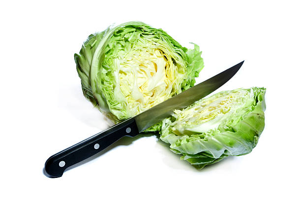 istock Head of cabbage and a knife 172912225