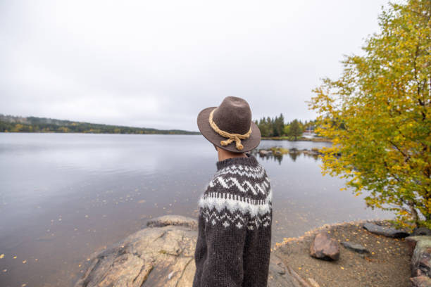 istock Lonely man contemplates nature in autumn 1729133327