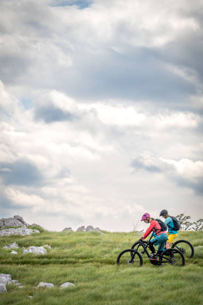 istock Two women riding electric mountain bikes 1729137523