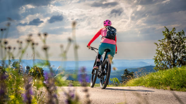 istock Woman riding electric mountain bikes 1729137957