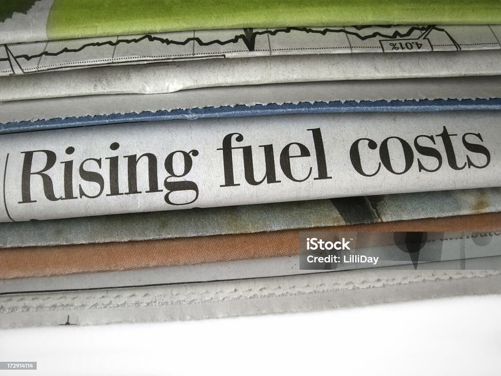 ライジング燃料費 - ガソリン料金のロイヤリティフリーストックフォト